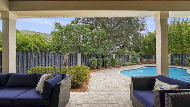 view of pool featuring a patio area and outdoor lounge area