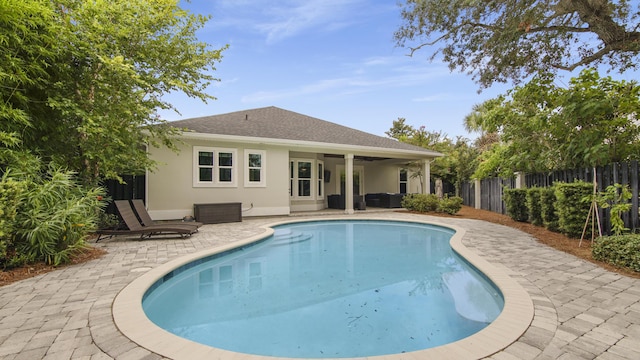 view of swimming pool with a patio area