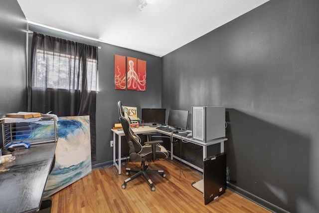 office featuring hardwood / wood-style floors