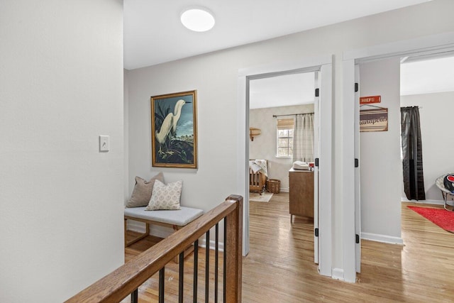 hallway featuring light hardwood / wood-style flooring