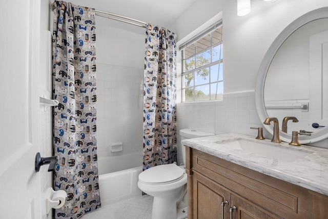 full bathroom featuring tile patterned floors, toilet, tile walls, vanity, and shower / bathtub combination with curtain