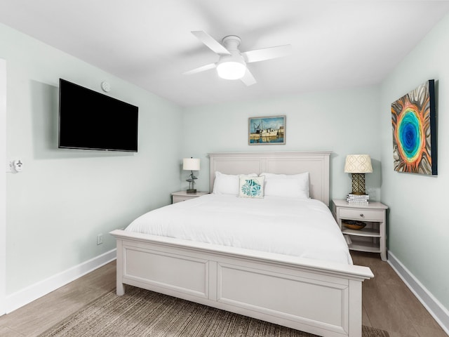 bedroom featuring ceiling fan and light wood-type flooring