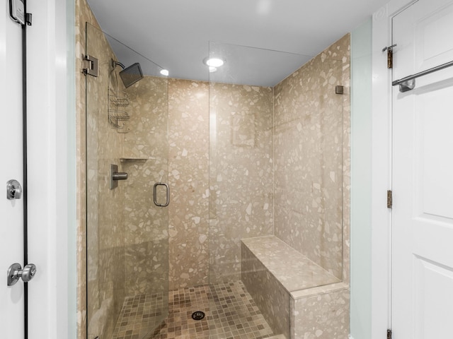 bathroom with an enclosed shower