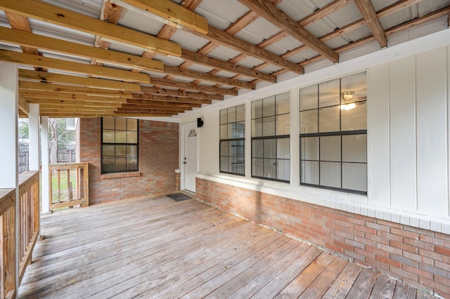 wooden deck featuring covered porch