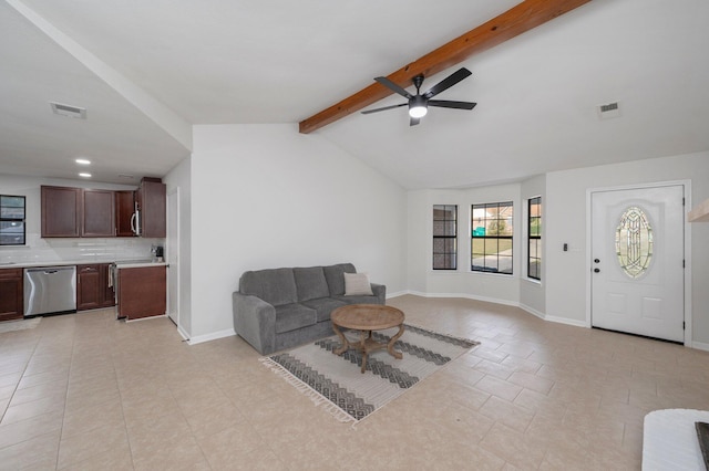 living room with lofted ceiling with beams, baseboards, visible vents, and ceiling fan