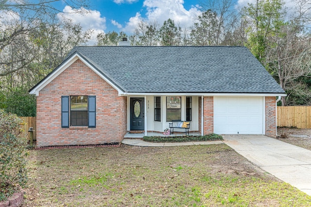 single story home with a garage, brick siding, fence, driveway, and a chimney