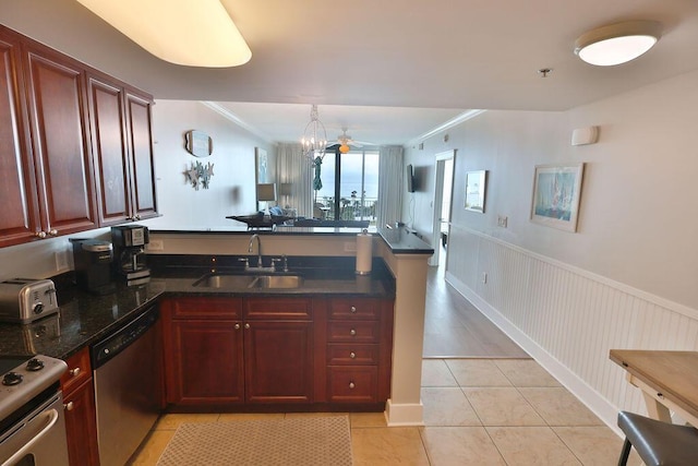 kitchen featuring sink, ornamental molding, dishwasher, and range