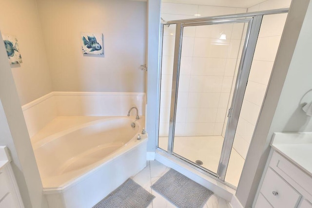 bathroom with vanity, tile patterned floors, and independent shower and bath