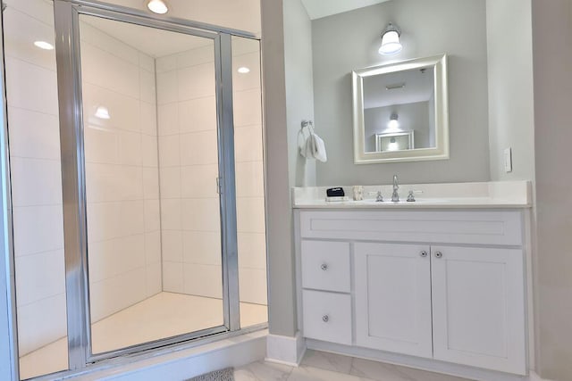 bathroom with vanity and walk in shower