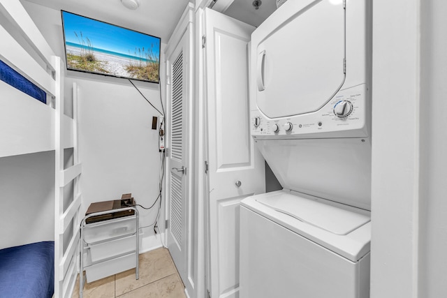 1110 Santa Rosa Blvd Unit C601, Fort Walton Beach, FL 32548 - laundry area with laundry area, light tile patterned floors, and stacked washer / drying machine