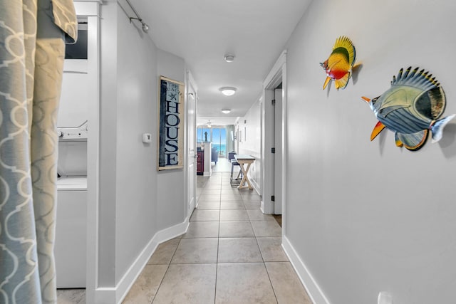 1110 Santa Rosa Blvd Unit C601, Fort Walton Beach, FL 32548 - hallway with light tile patterned flooring and baseboards