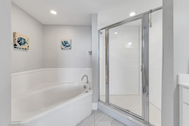 1110 Santa Rosa Blvd Unit C601, Fort Walton Beach, FL 32548 - bathroom with recessed lighting, marble finish floor, a bath, and a shower stall