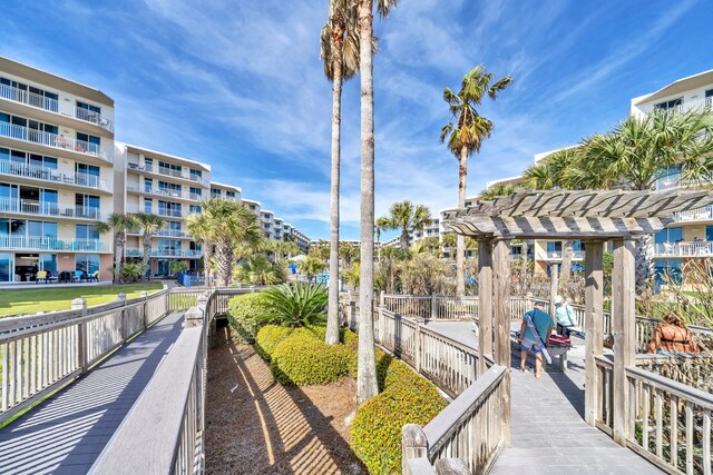 1110 Santa Rosa Blvd Unit C601, Fort Walton Beach, FL 32548 - surrounding community with a pergola and fence
