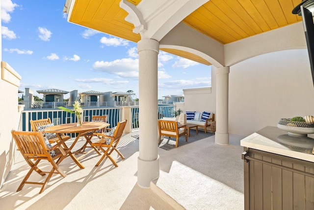 view of patio with a balcony