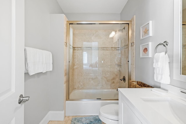 full bathroom with toilet, vanity, and shower / bath combination with glass door