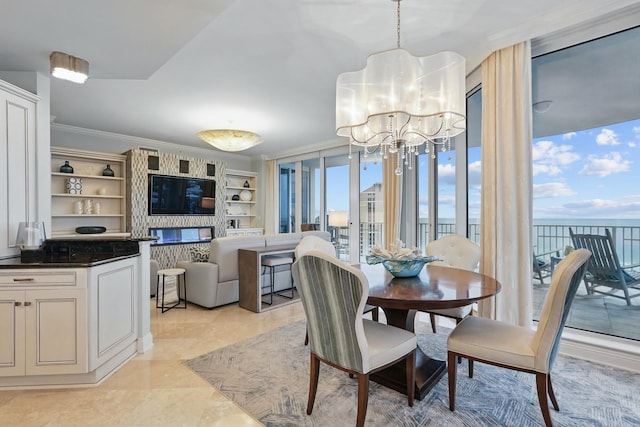 dining space with an inviting chandelier and ornamental molding