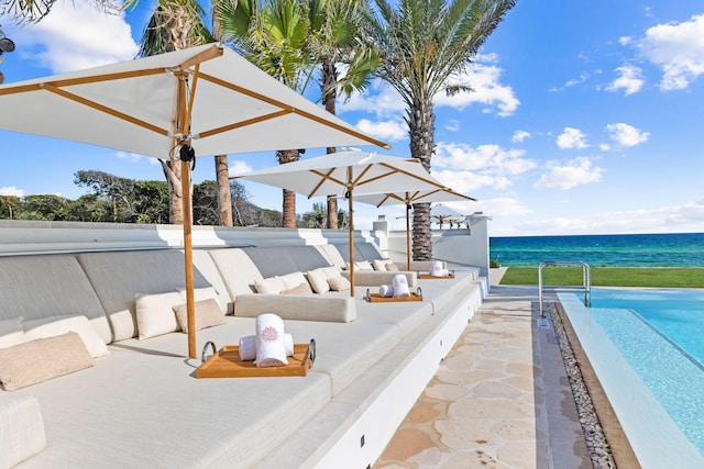 view of patio / terrace with a water view