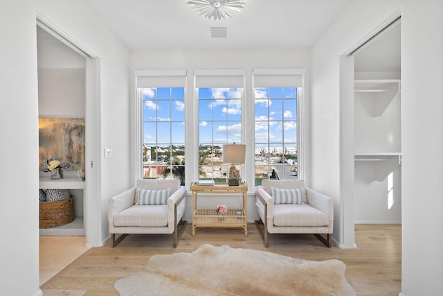 sitting room with light wood-type flooring