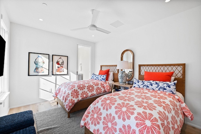 bedroom featuring wood-type flooring and ceiling fan