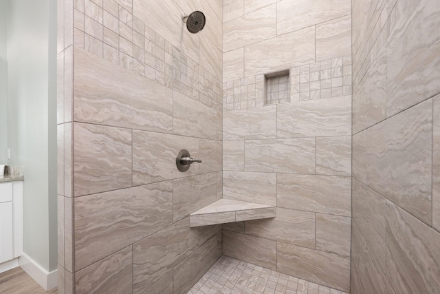 bathroom featuring tiled shower