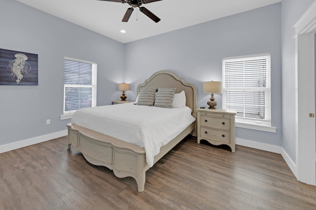 bedroom featuring ceiling fan and wood-type flooring