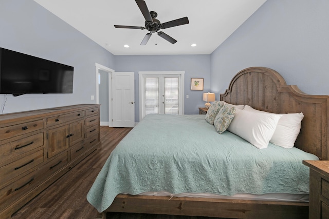 bedroom with ceiling fan and dark hardwood / wood-style flooring