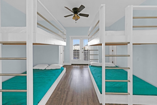 unfurnished bedroom featuring dark hardwood / wood-style flooring, french doors, and ceiling fan