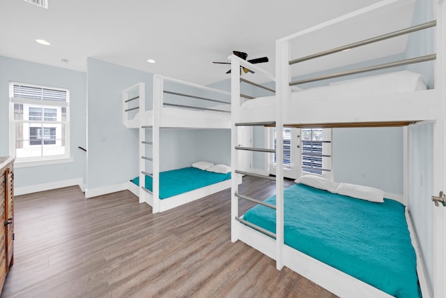 bedroom with wood-type flooring