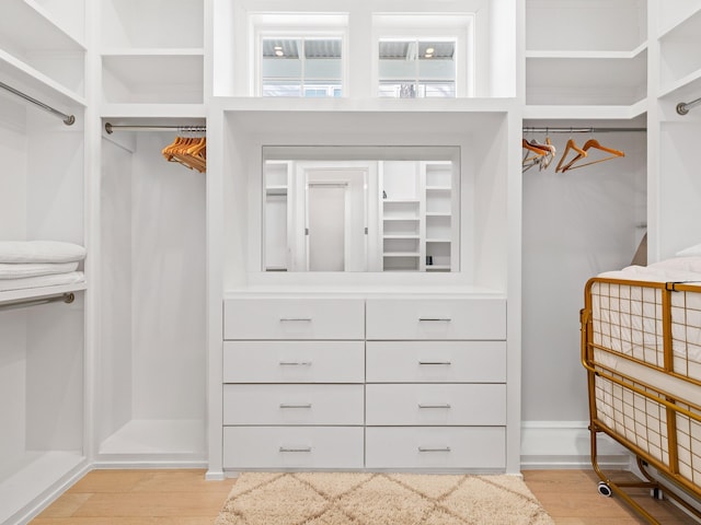 spacious closet with light wood-type flooring