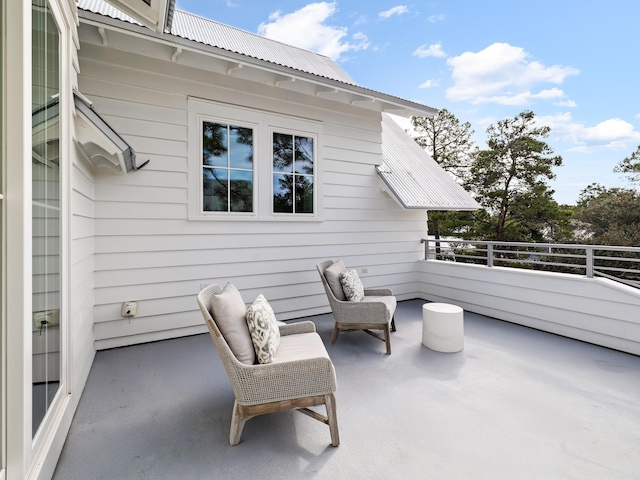 view of patio / terrace featuring a balcony