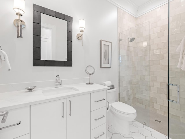 bathroom featuring vanity, an enclosed shower, and toilet