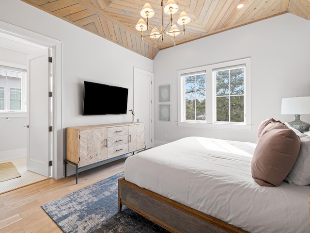 bedroom with an inviting chandelier, wood ceiling, vaulted ceiling, and hardwood / wood-style flooring