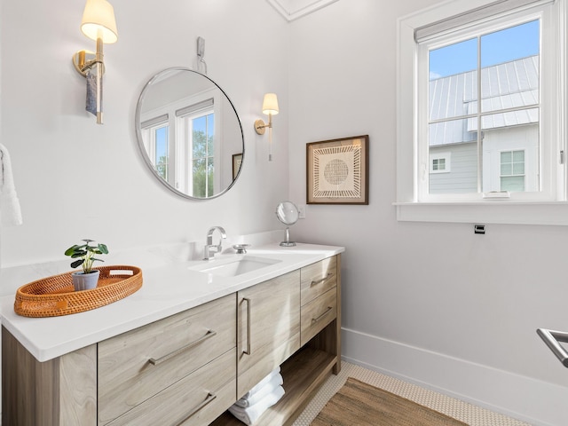 bathroom featuring vanity and a wealth of natural light