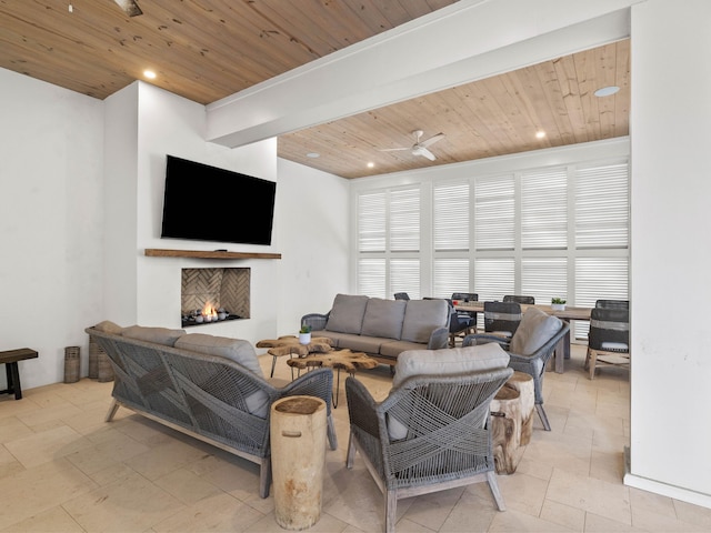 living room with wooden ceiling and ceiling fan