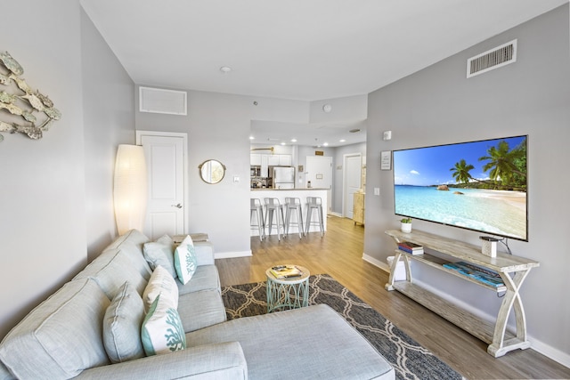 living room featuring light hardwood / wood-style flooring