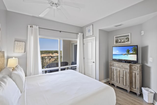 bedroom featuring ceiling fan, access to exterior, and light wood-type flooring