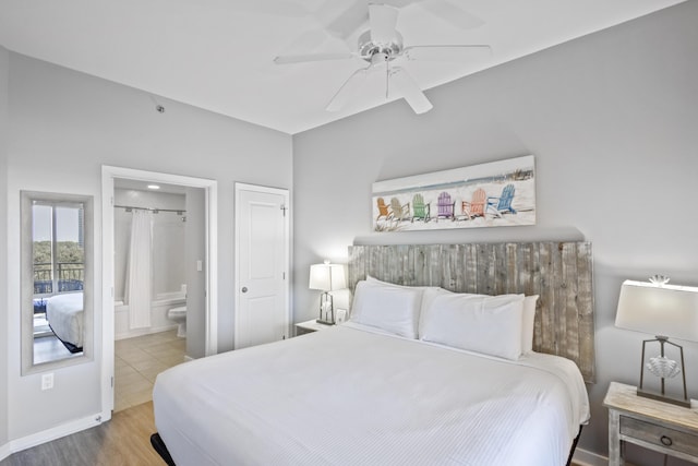 bedroom featuring wood-type flooring, connected bathroom, and ceiling fan