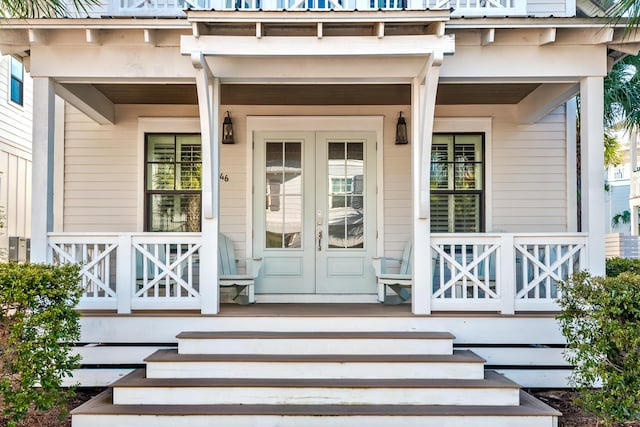 property entrance featuring french doors