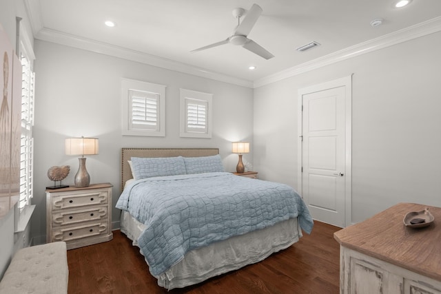 bedroom featuring dark hardwood / wood-style flooring, crown molding, and ceiling fan