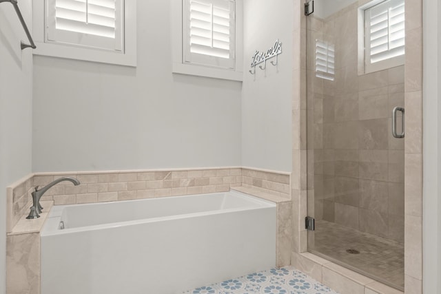 bathroom with independent shower and bath