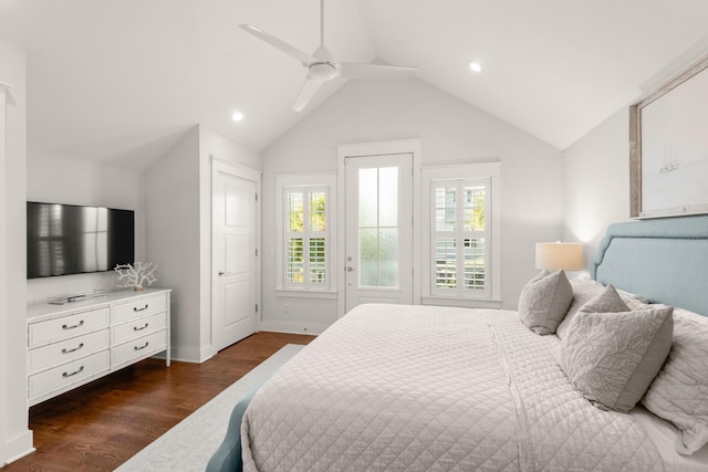 bedroom with ceiling fan, dark hardwood / wood-style floors, and vaulted ceiling