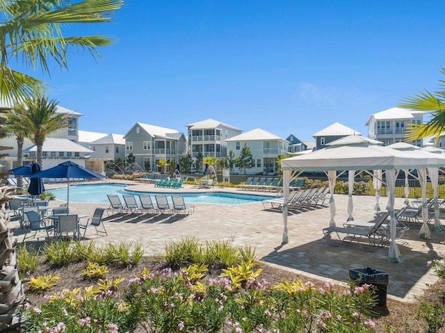 view of pool with a gazebo and a patio area