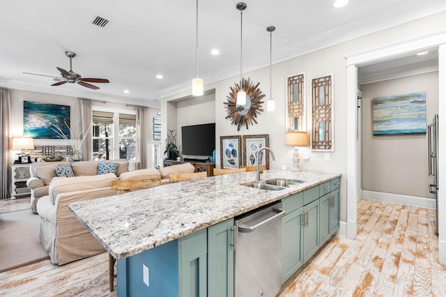 kitchen with dishwasher, an island with sink, sink, hanging light fixtures, and crown molding