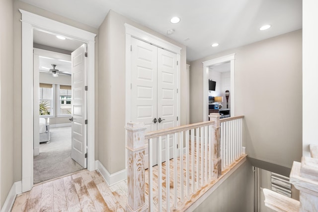 hall featuring light hardwood / wood-style flooring