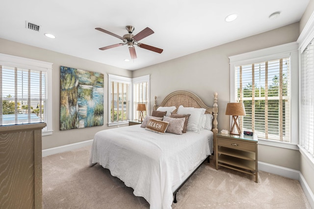 carpeted bedroom with ceiling fan