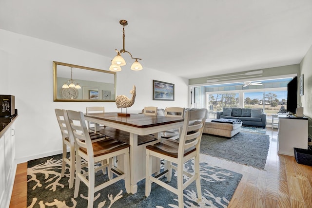 dining area featuring light hardwood / wood-style flooring