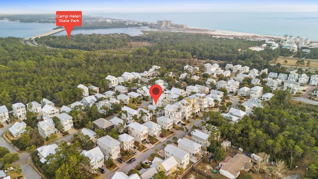 bird's eye view with a residential view and a water view