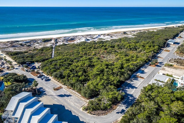 bird's eye view with a view of the beach and a water view