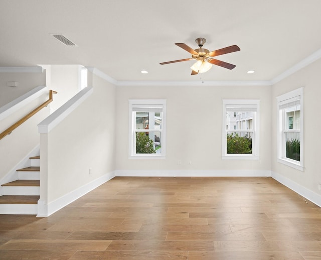 bonus room with visible vents, stairway, baseboards, and wood finished floors