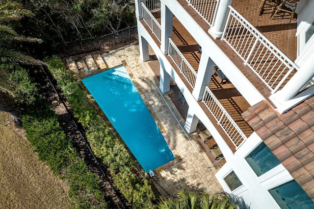 view of swimming pool featuring a patio area